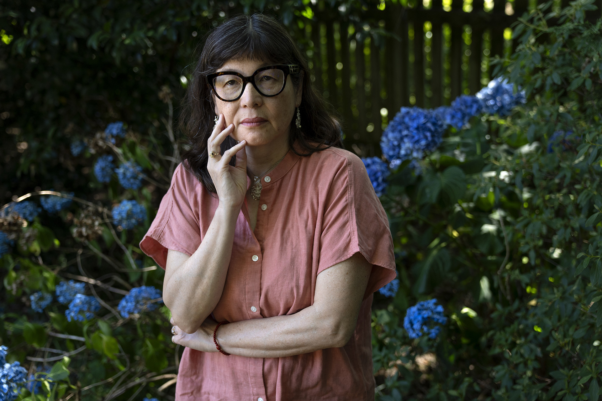 Alice Stephens stands and poses for a portrait outside.